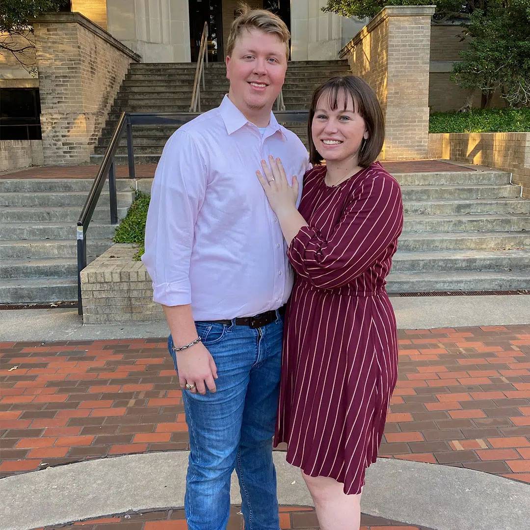 Photo of couple together at proposal at Texas State