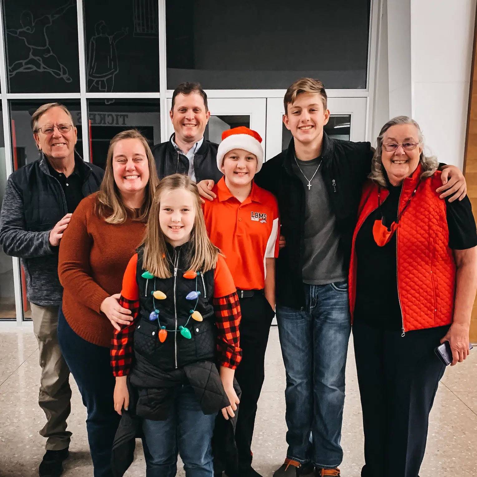 Photo of family wearing Christmas attire