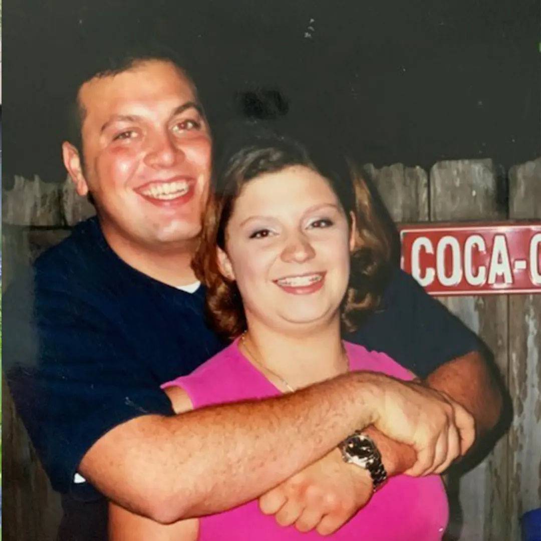 Photo of man and woman hugging each other and smiling