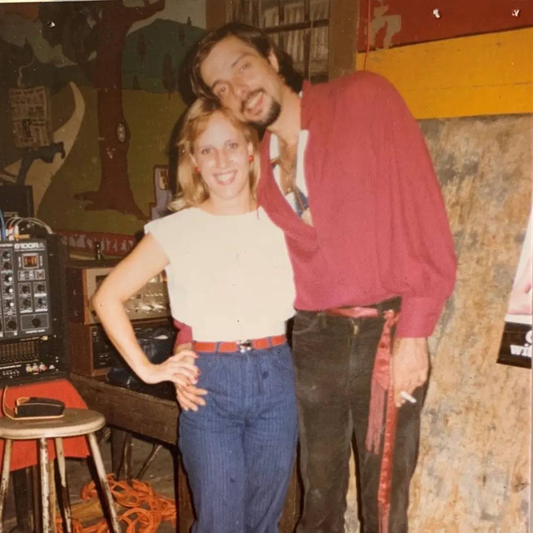 Vintage photo of couple standing together and smiling