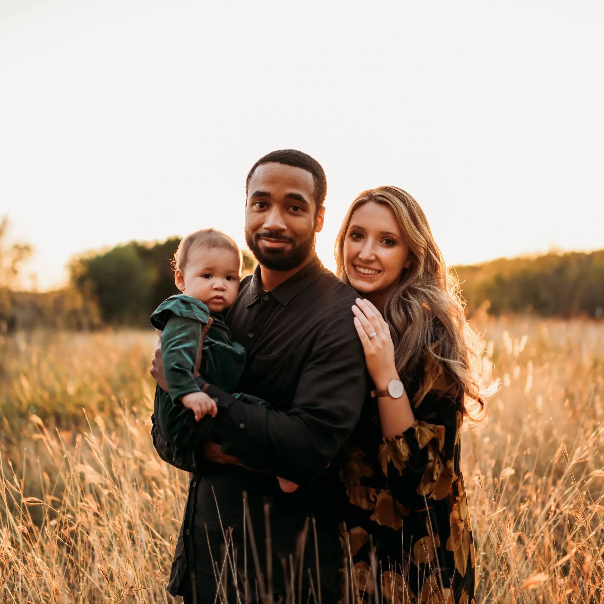 family portrait in a field