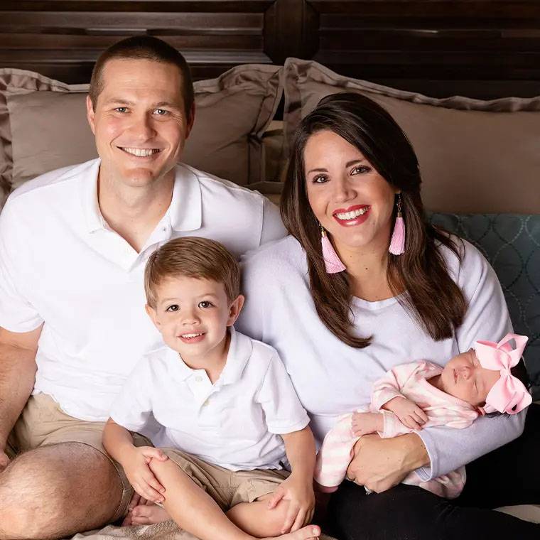 group photo of family with their children