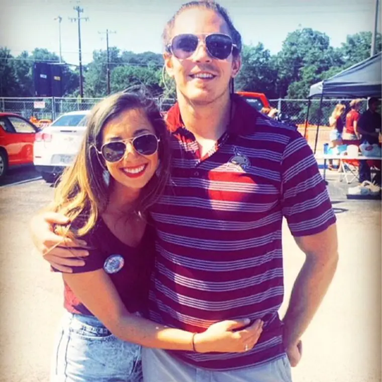 photo of couple at TXST tailgate