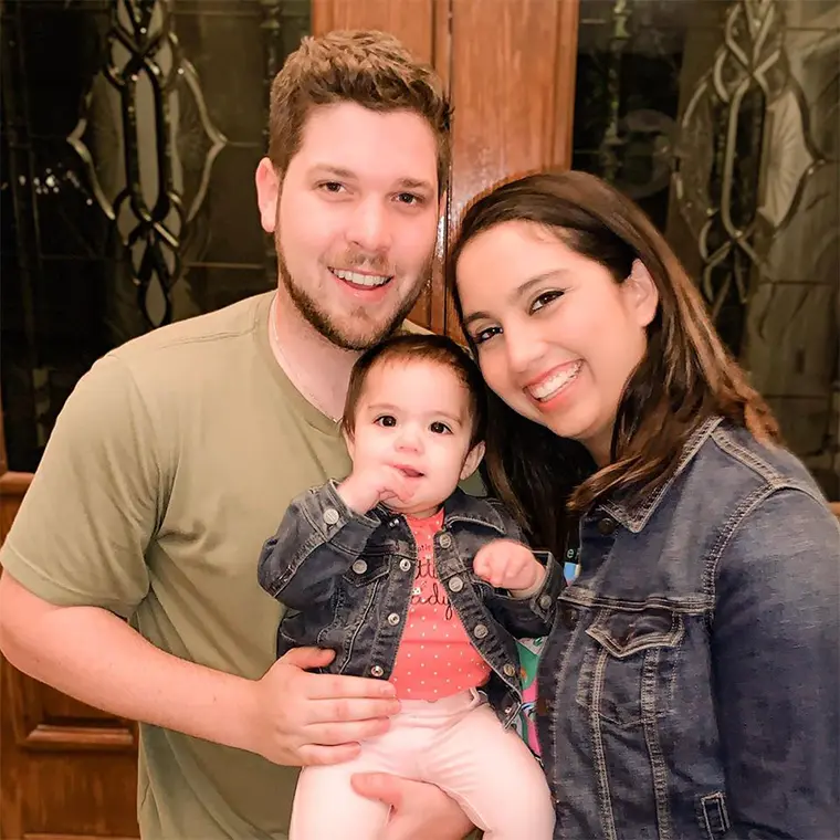 photo of couple with their baby