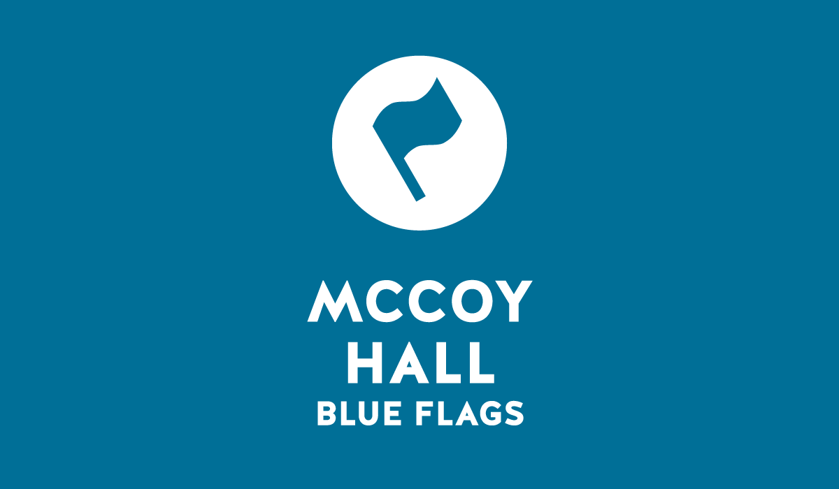 blue graphic with flag and caption: "McCoy Hall - blue flags"
