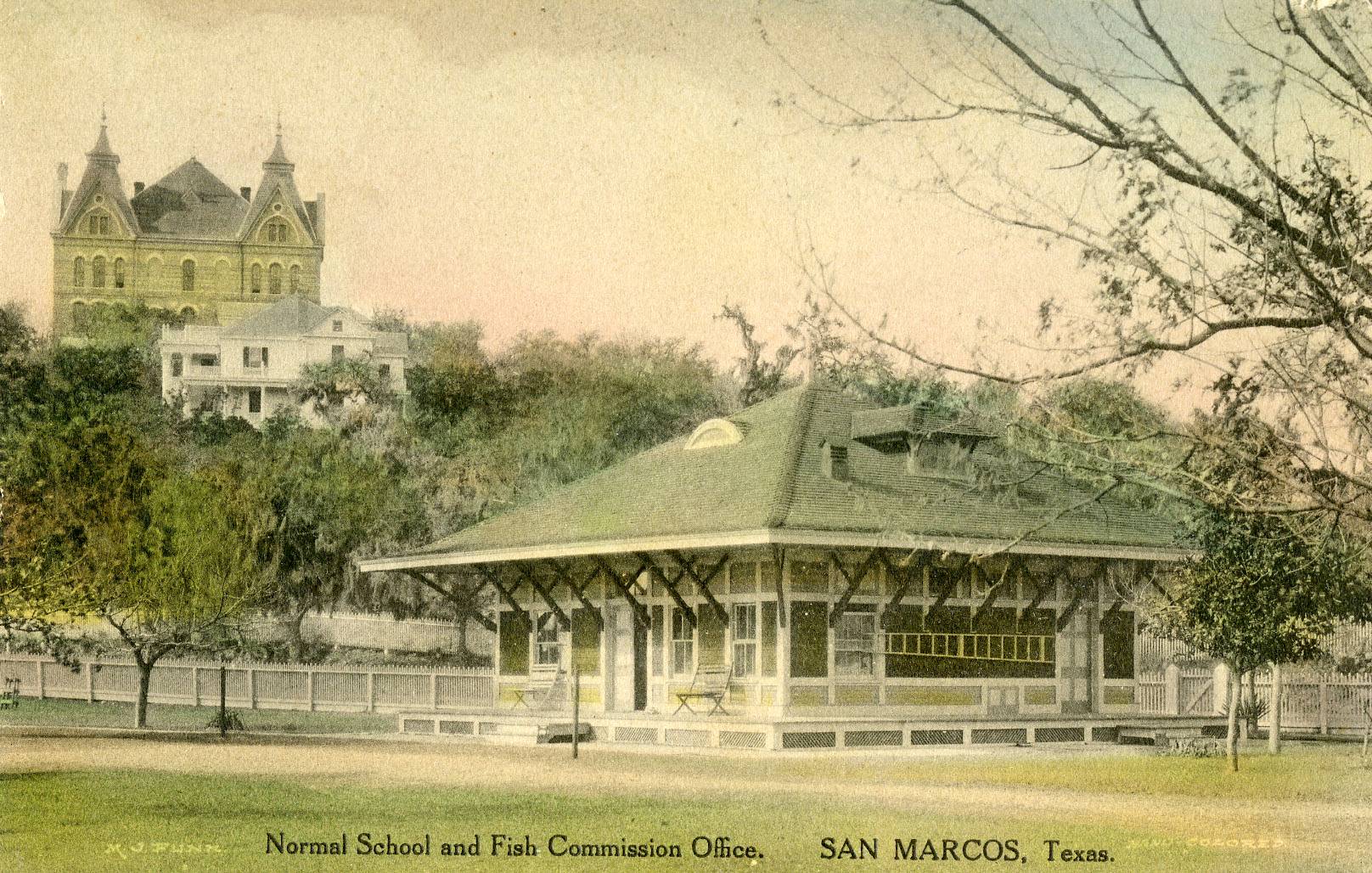 postcard image of a photograph of the Texas State Normal School and fish commissions office in San Marcos, Texas