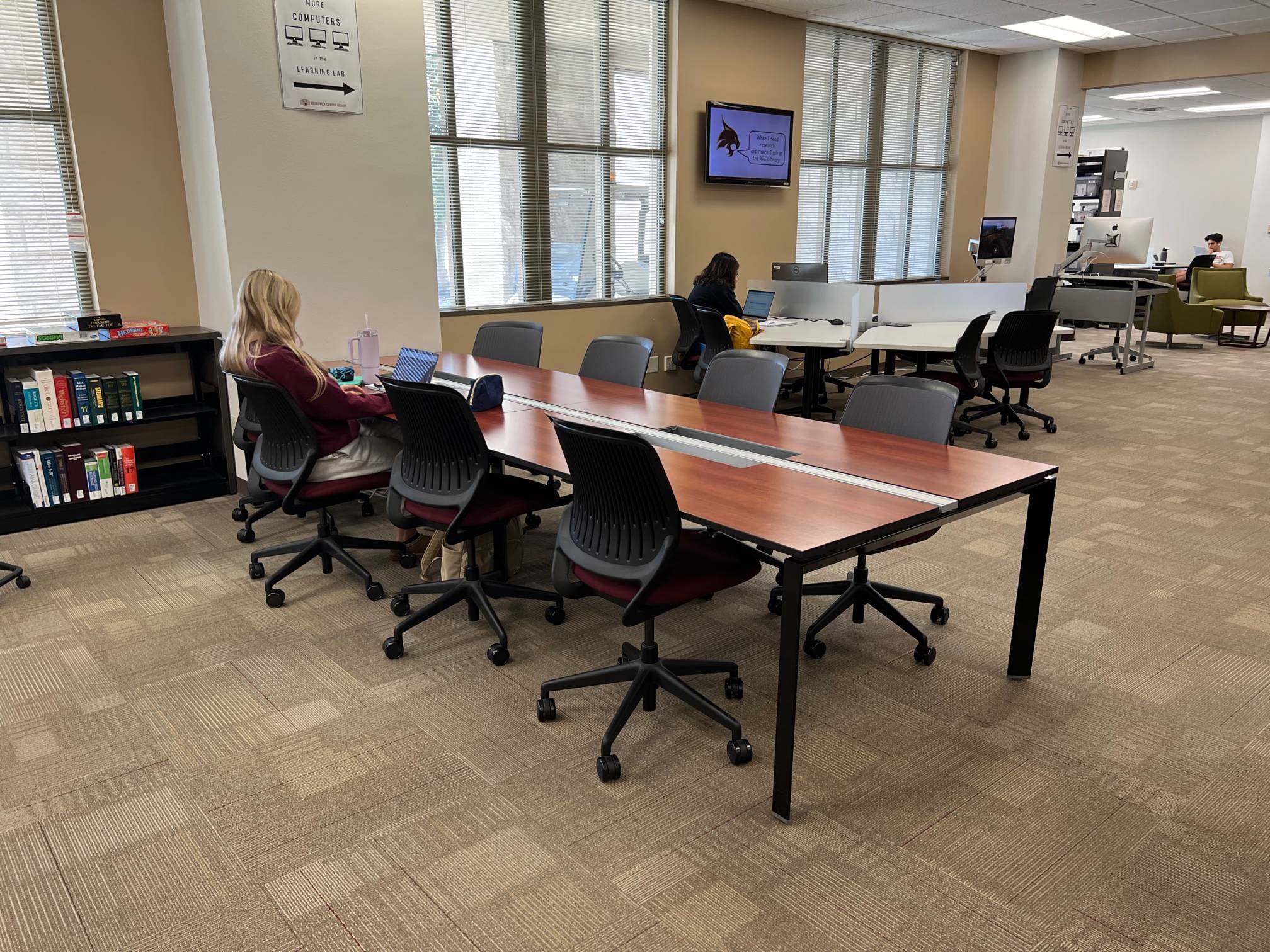 a big table with eight chairs