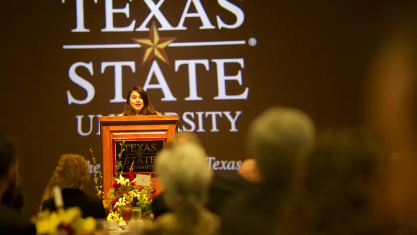 Polanco speaking at ceremony