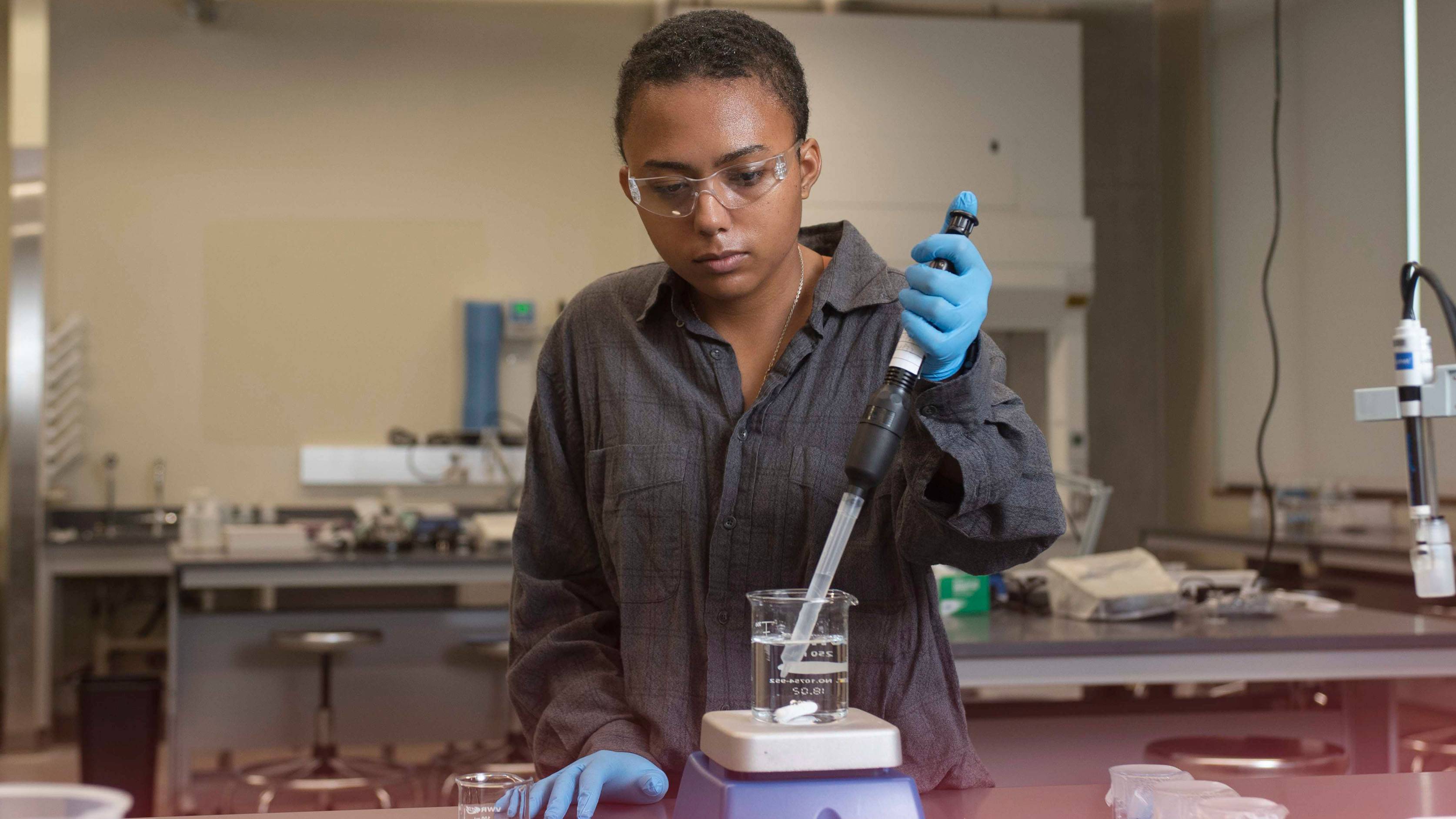 a student conducting research in a lab