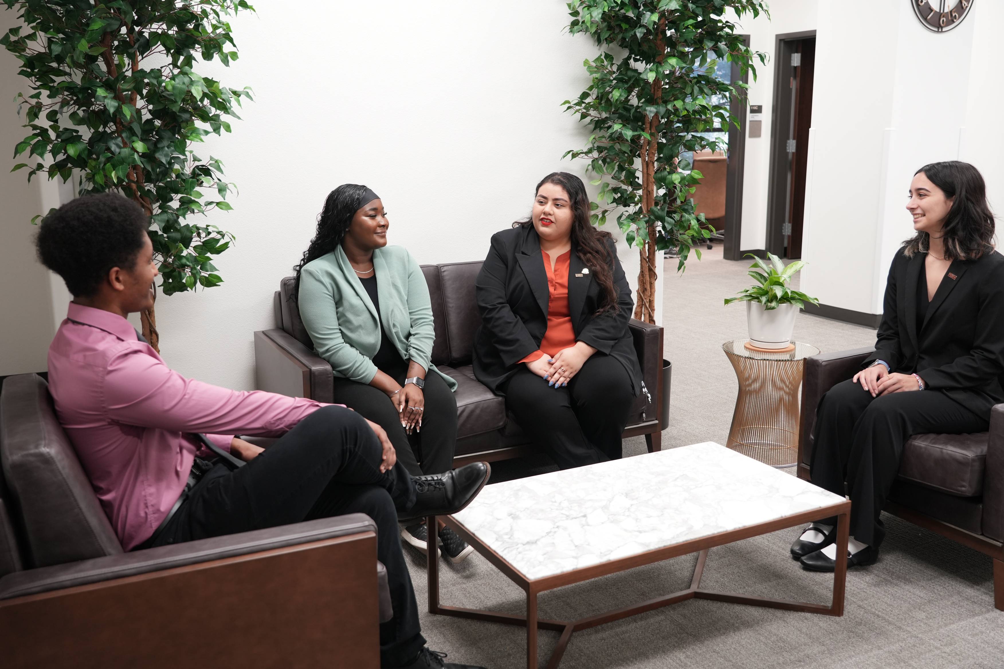 student business council members sitting in the student success center