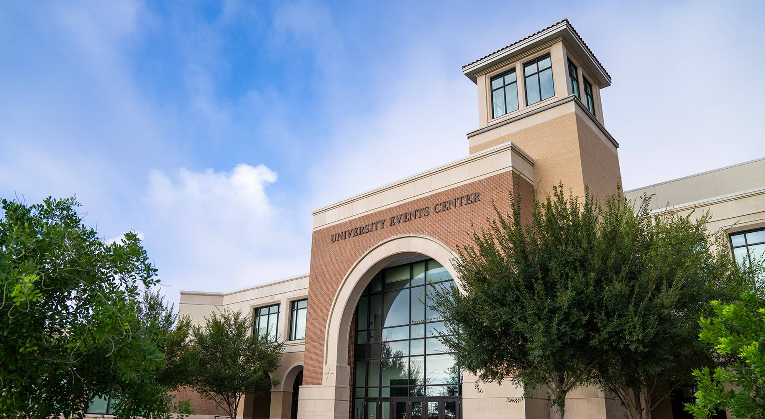 exterior shot of university events center on txst campus