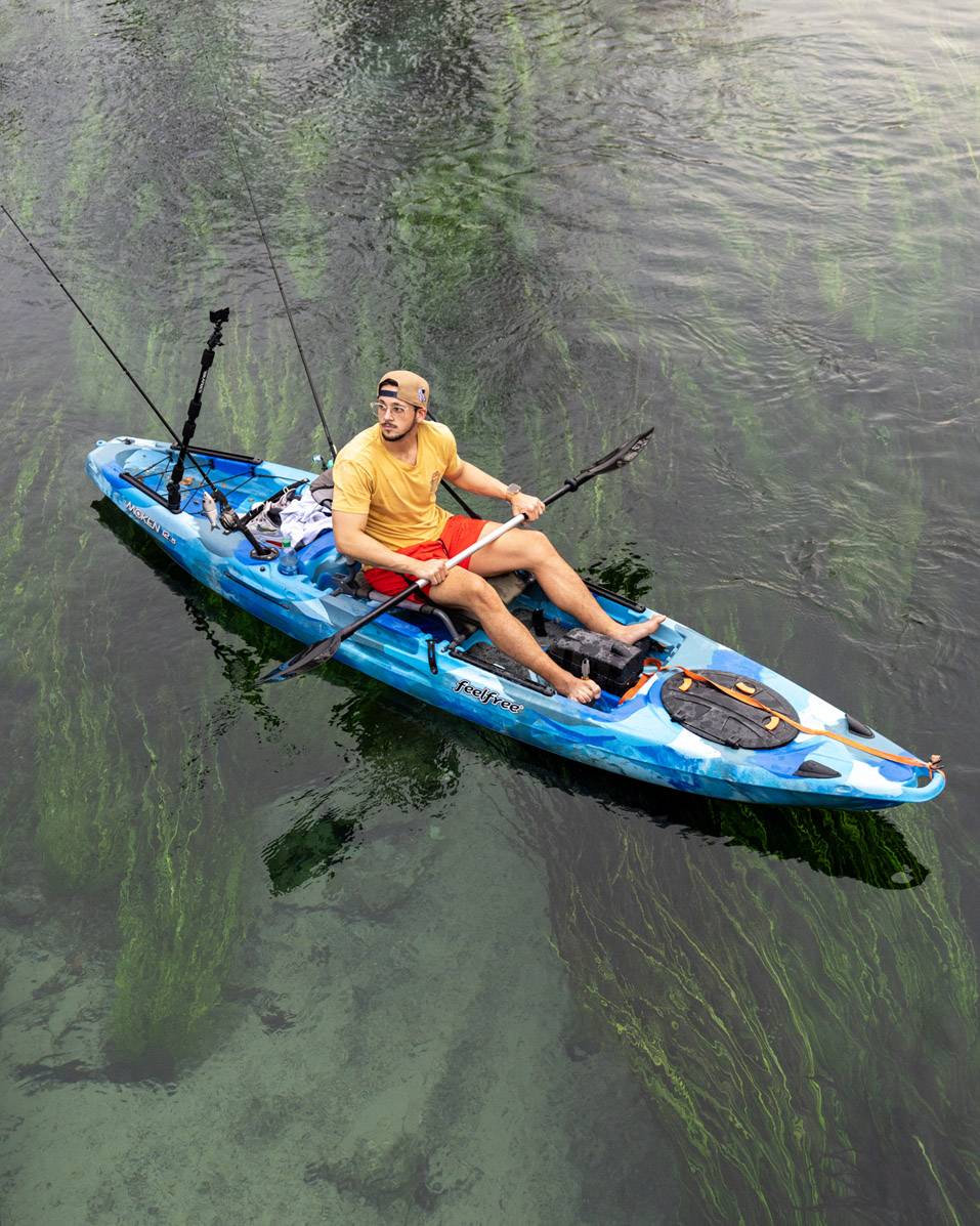 man in a kayak on river