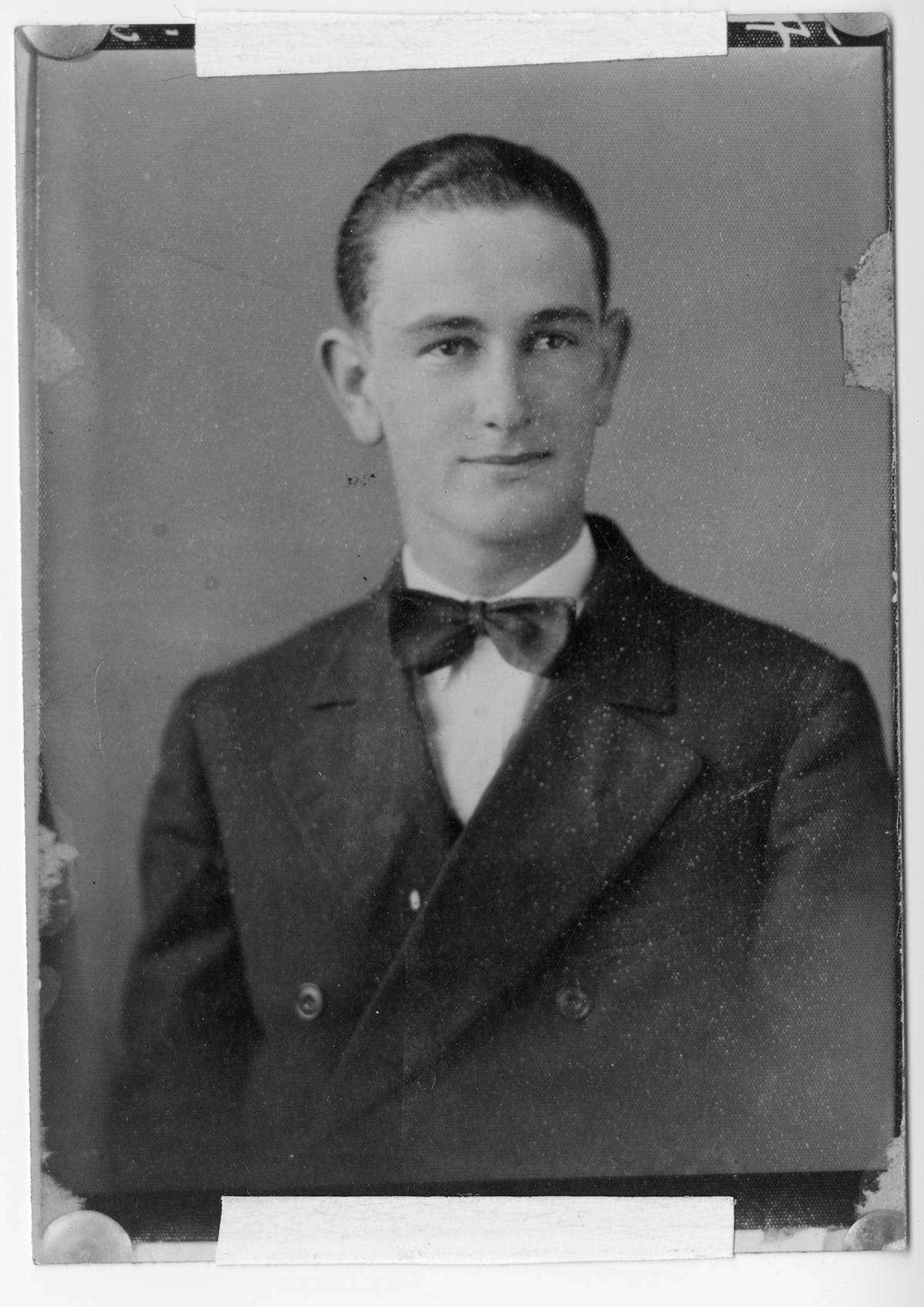  A youthful Lyndon B. Johnson poses joyfully for a photo. Sporting a slick, back-swept mane, and a slight smirk, LBJ appears confident and ready to succeed. 