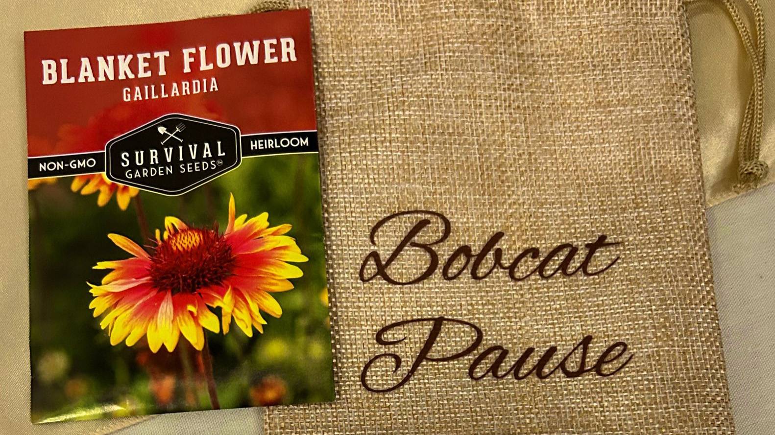 A seed bag with the words "Bobcat Pause" printed on it.
