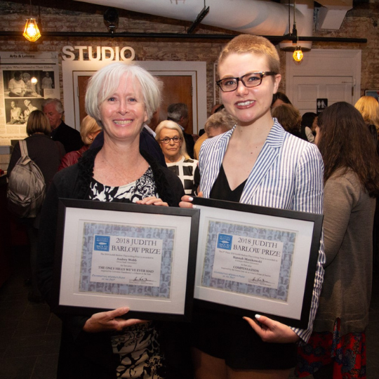 Photo of Audrey Webb with the Judith Barlow Prize Certificate