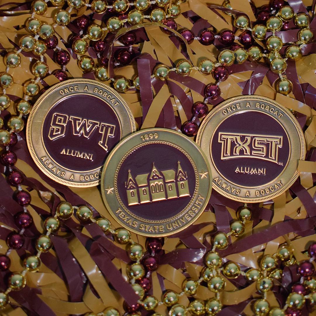 SWT and TXST maroon and gold challenge coins