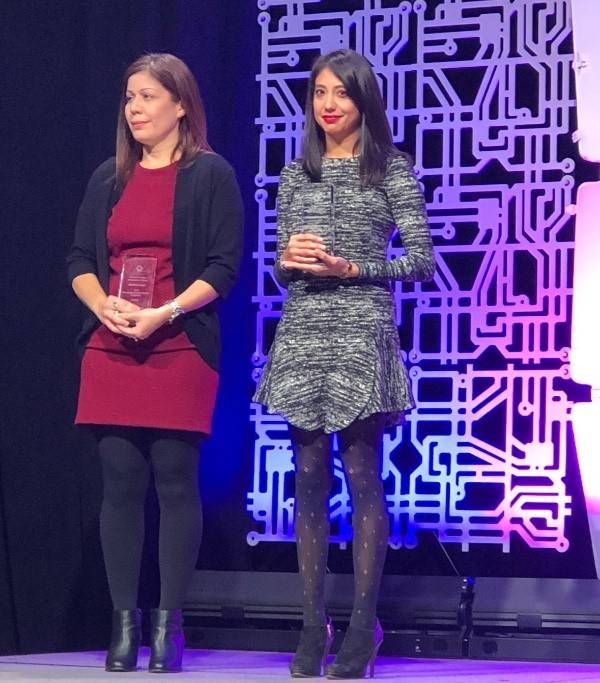 Vanessa Gonzalez (right) accepting the Elementary School Science Teacher of the Year award at STAT's annual Conference for the Advancement of Science Teaching
