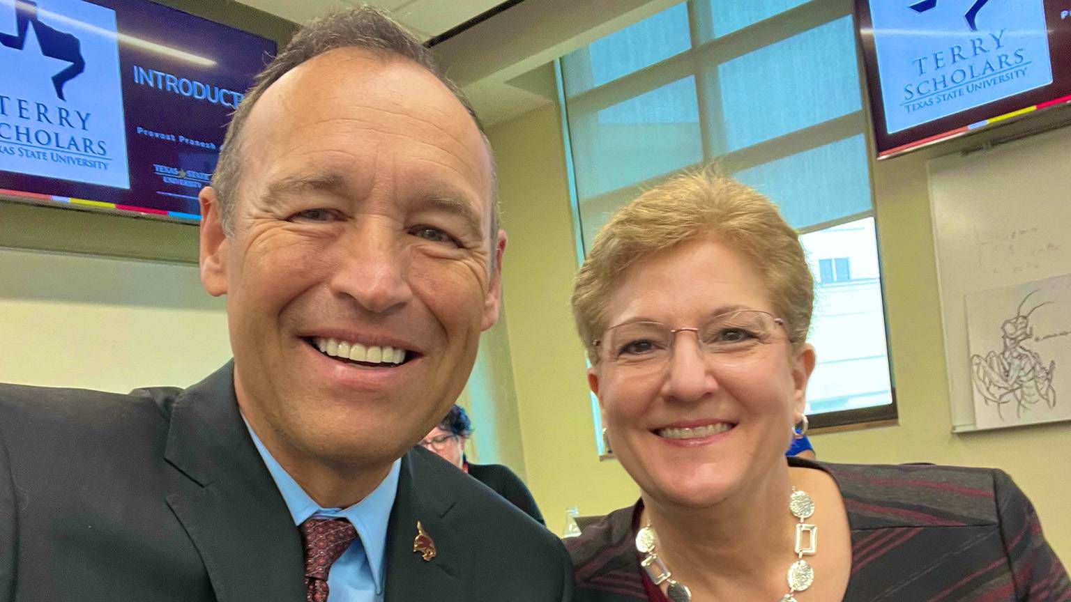 President Damphousse (left) poses for a photo with Yvonne Moody.