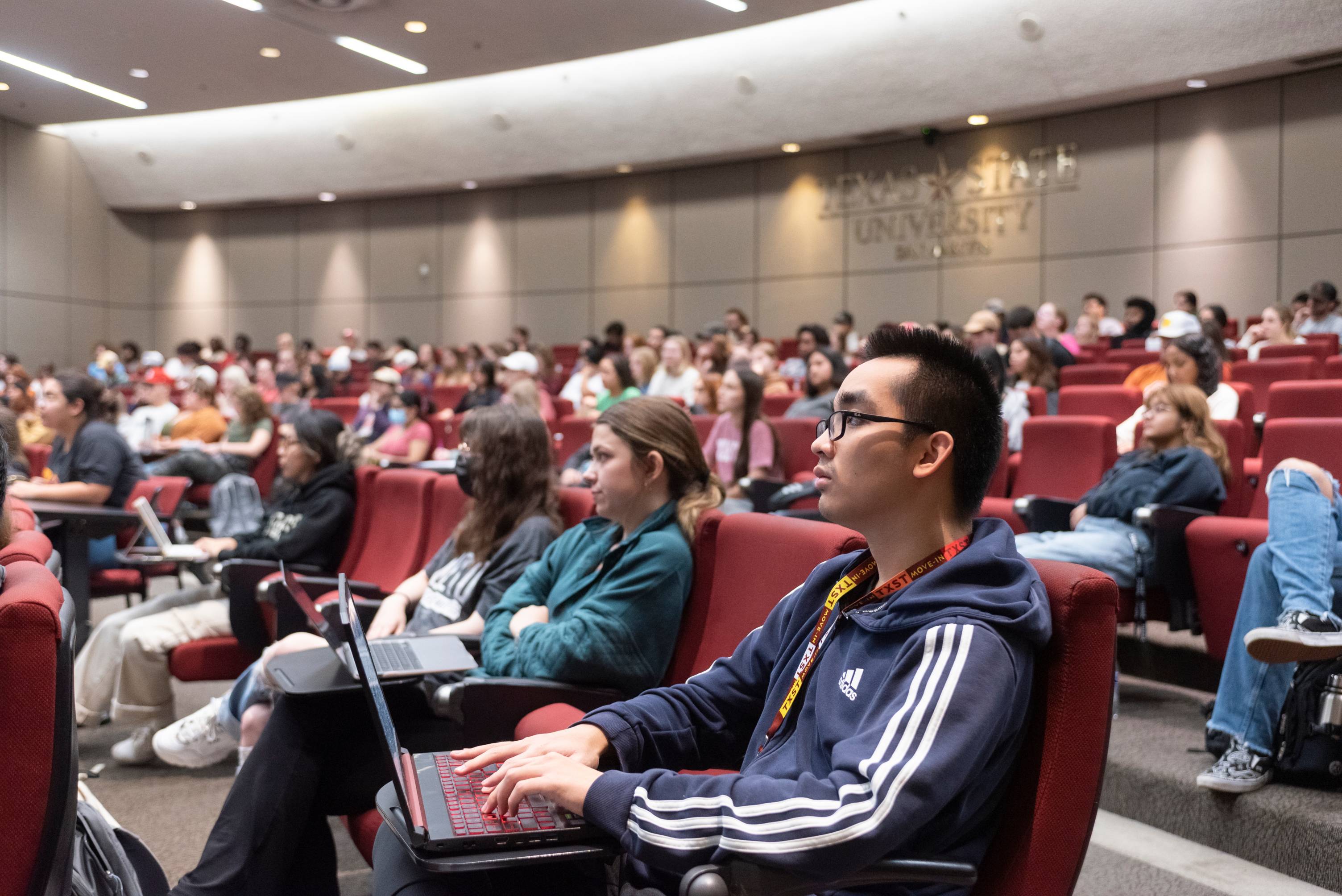 Students being attentive in a texas state teaching theatre