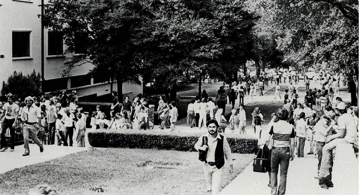 A photo from the 1980 "Pedagog" yearbook captures a busy day on the Quad.