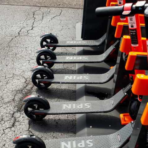 Spin scooters in a row