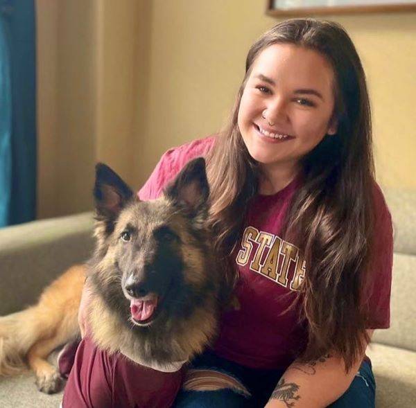 Kathleen Padilla and her service dog, Phyl