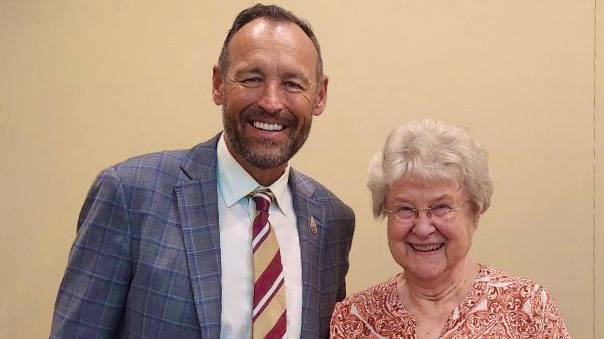 President Damphousse (left) poses for a photo with Amy Beck.