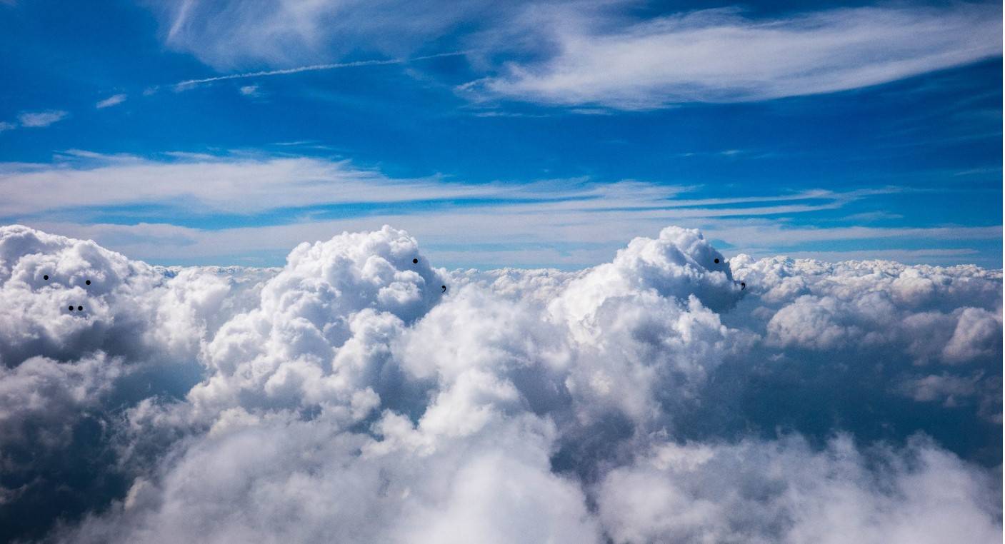 Picture of clouds with dots for eyes in bears