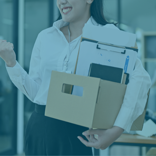 man in maroon shirt, packing box on office table