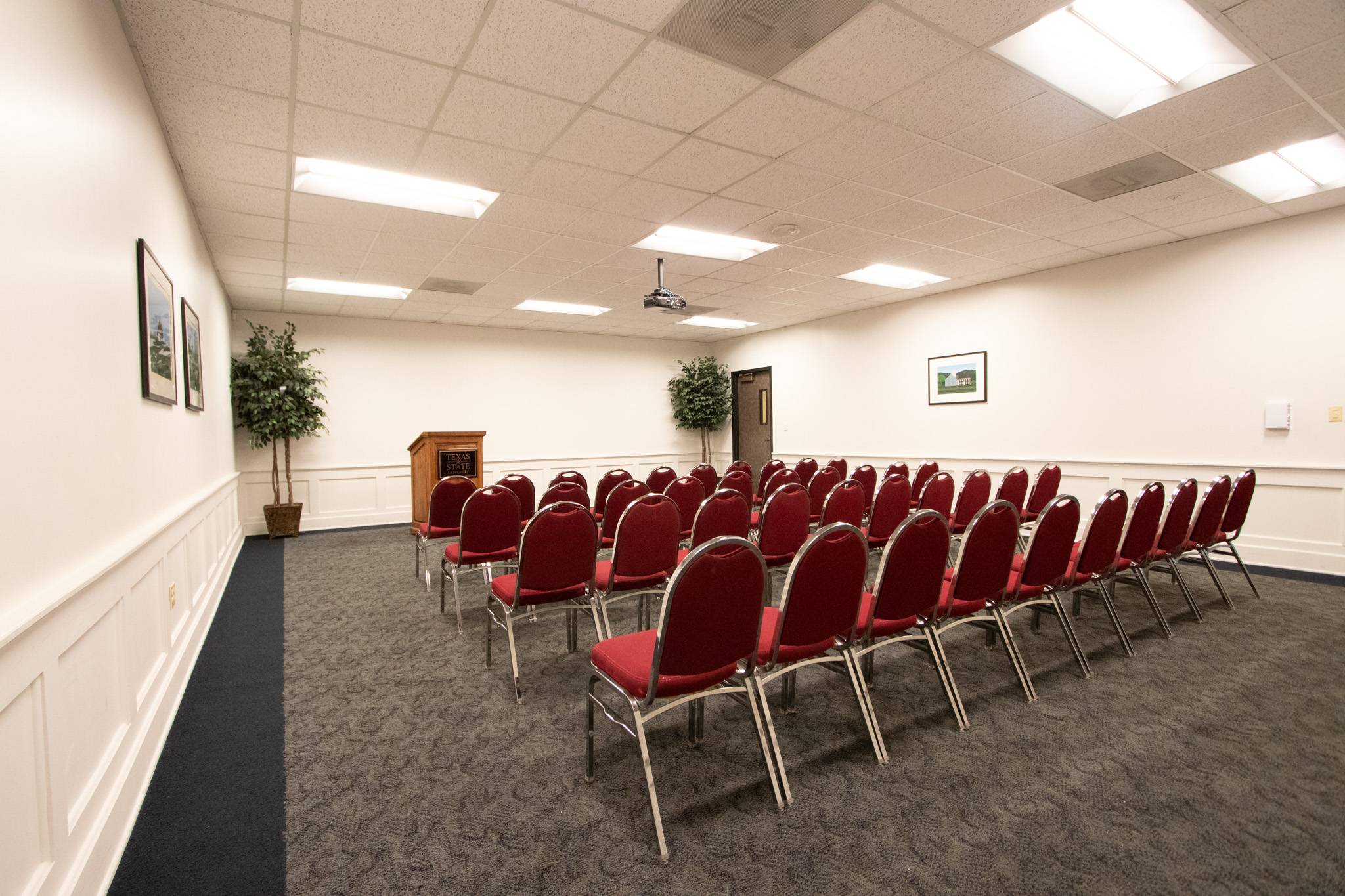 A room with tables and chairs