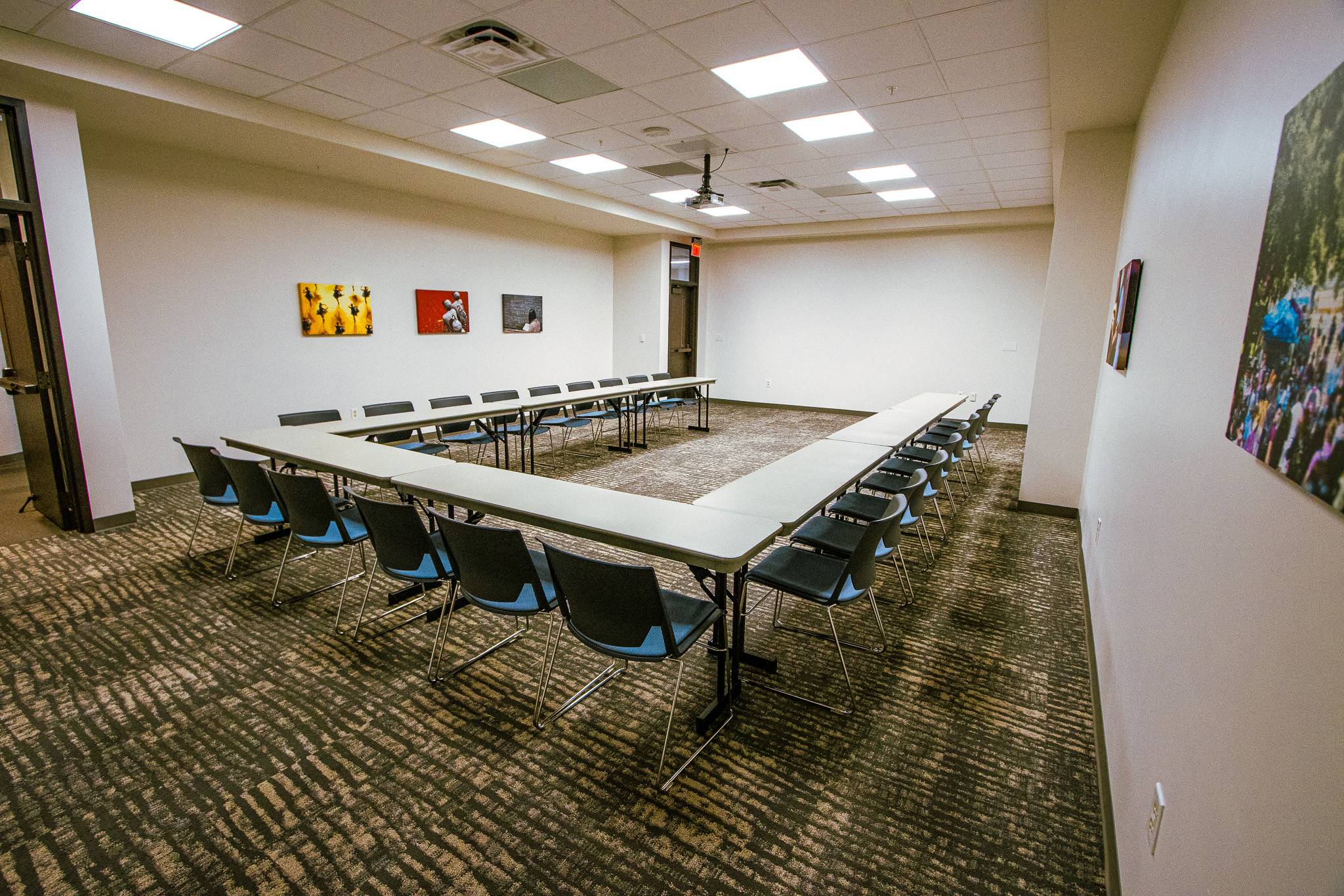 A room with tables and chairs