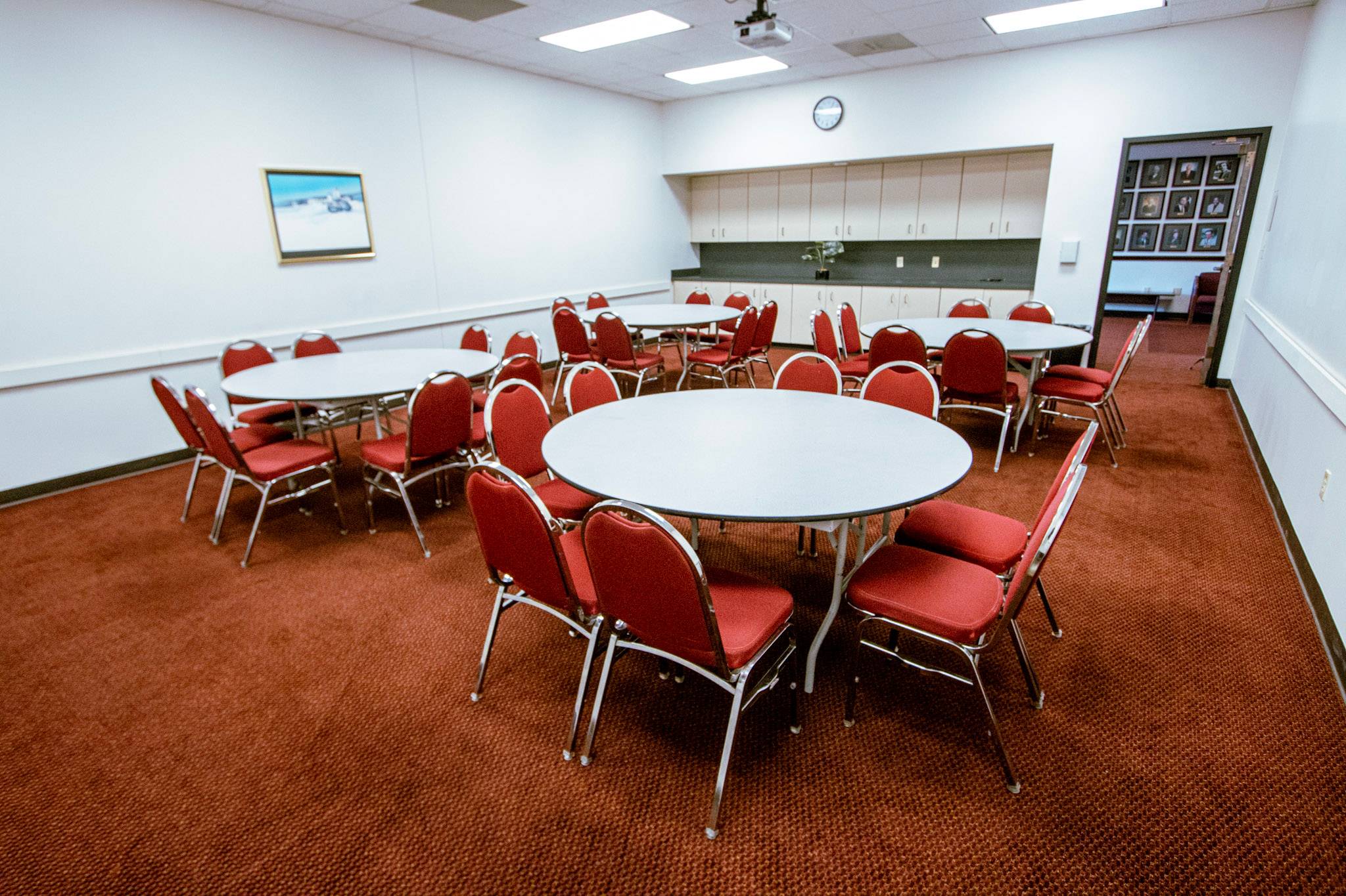 A room with tables and chairs