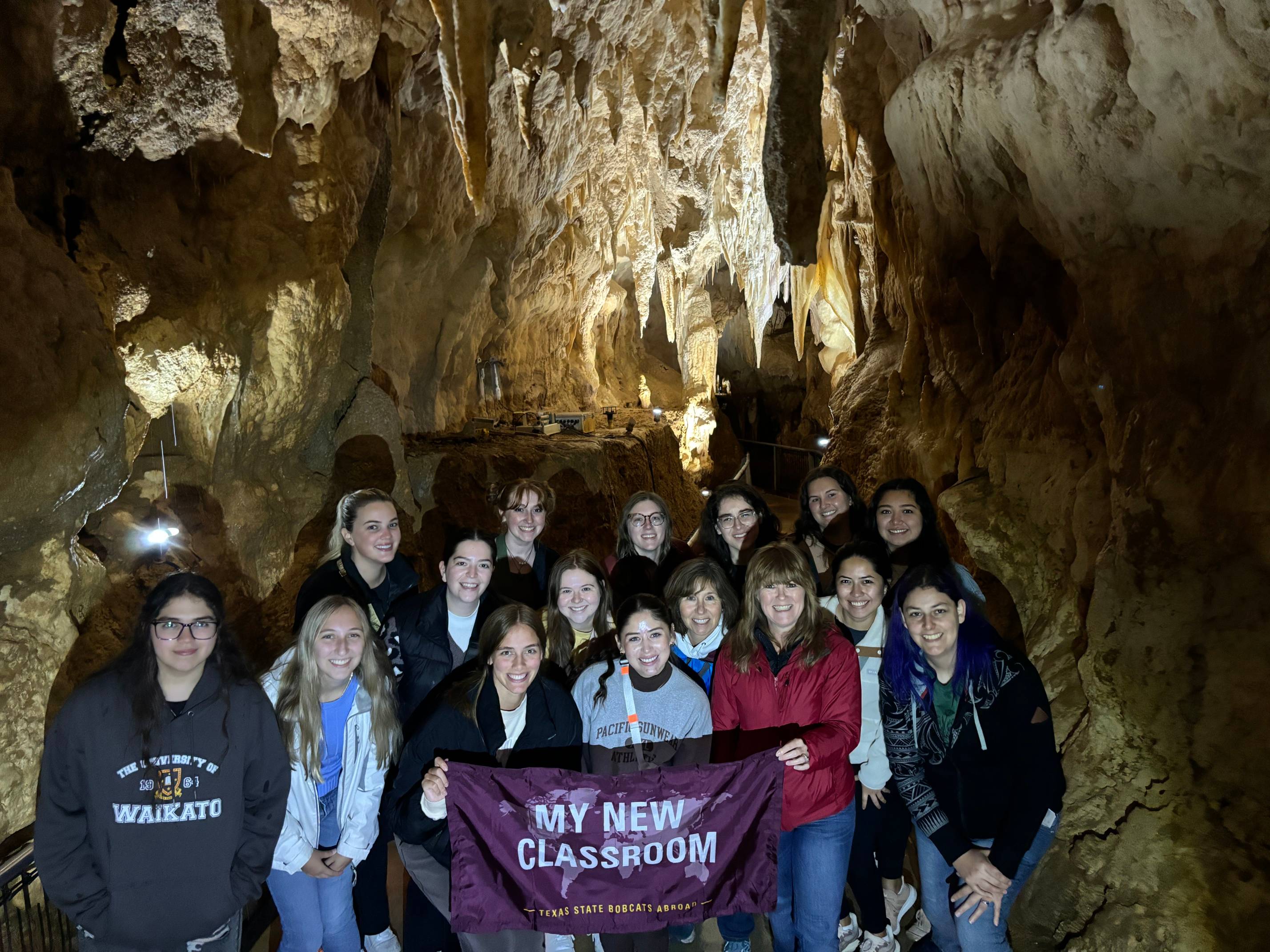 students in cave