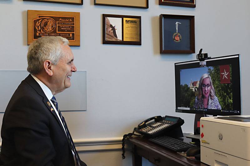 U.S. Rep. Lloyd Doggett, D-Austin, and Dr. Melinda Villagran discuss mental health mapping project over a video call.