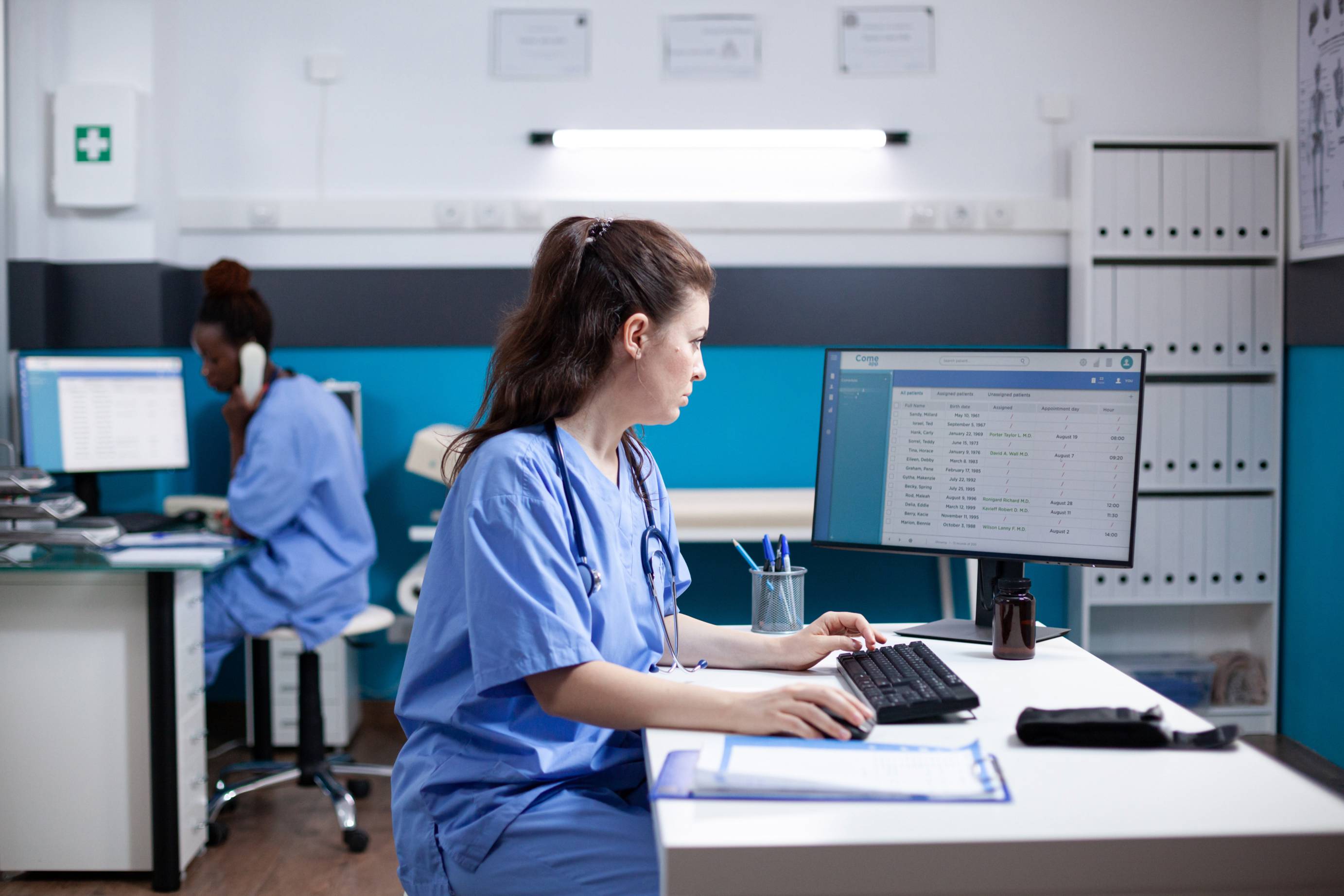 medical person at desk