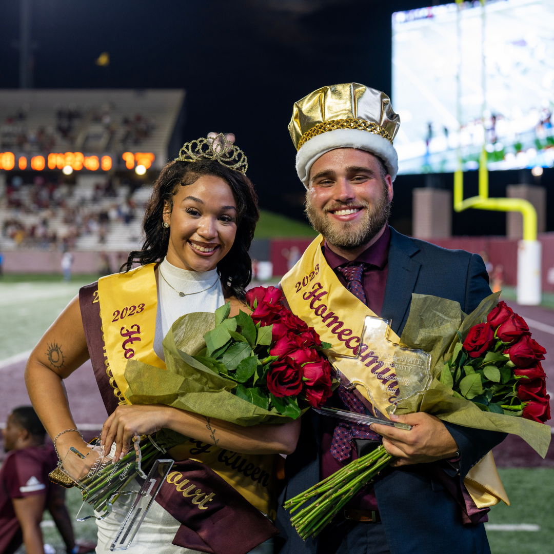 TXST 2023 Homecoming King and Queen on the field of UFCU Stadium