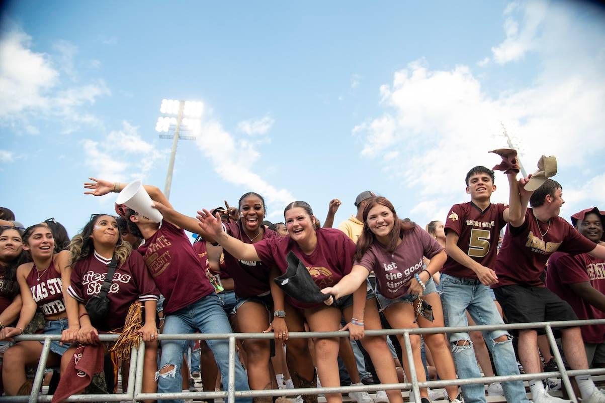 A crowd of students Cheering