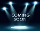 Dark background with spotlights on the headline "coming soon"