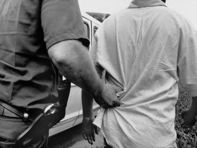 Photo of man getting arrested by Susan Meiselas