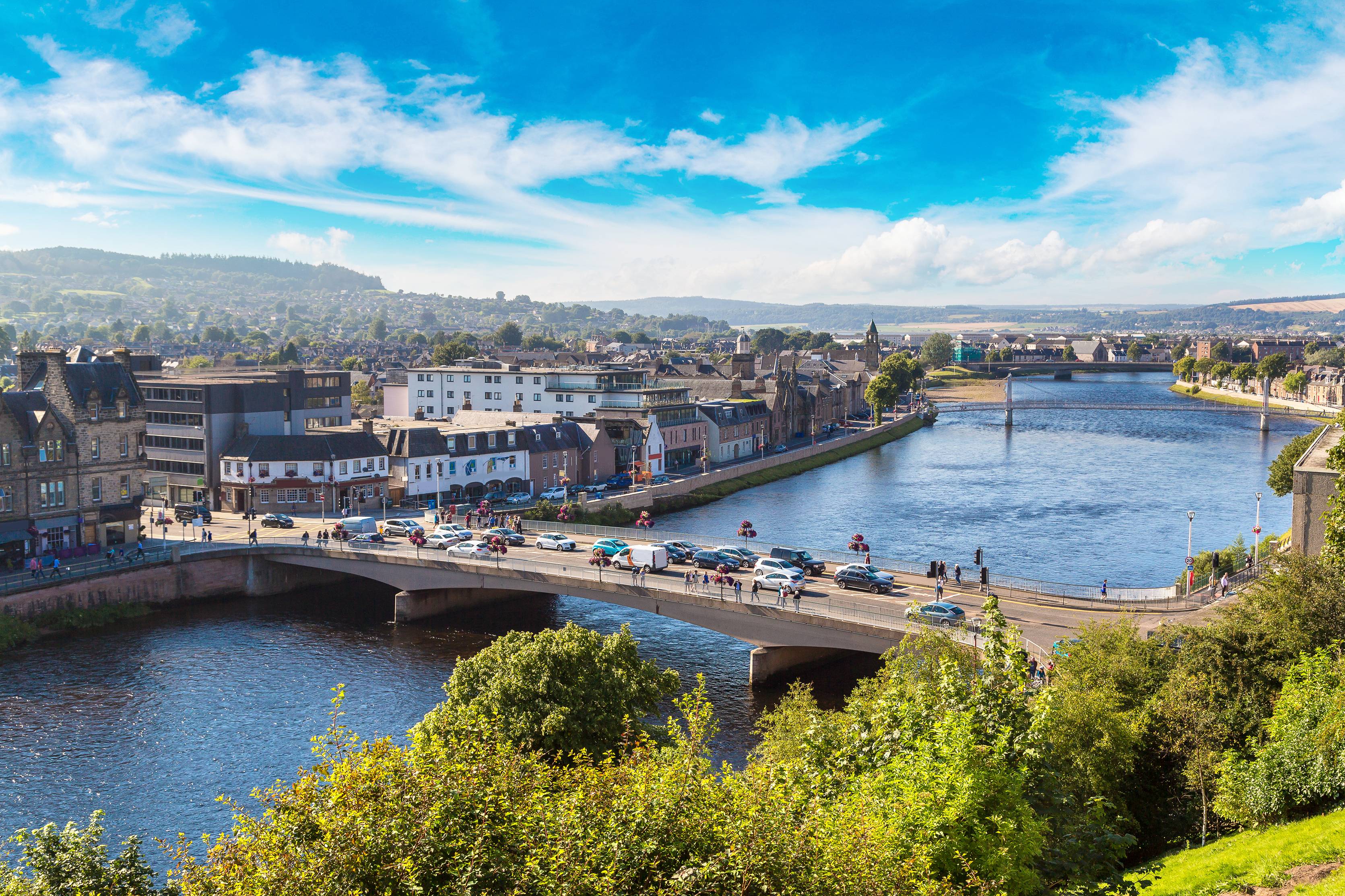 Aerial view of pedestrian and vehicular accessible River Ness bridge in Inverness, Scotland.