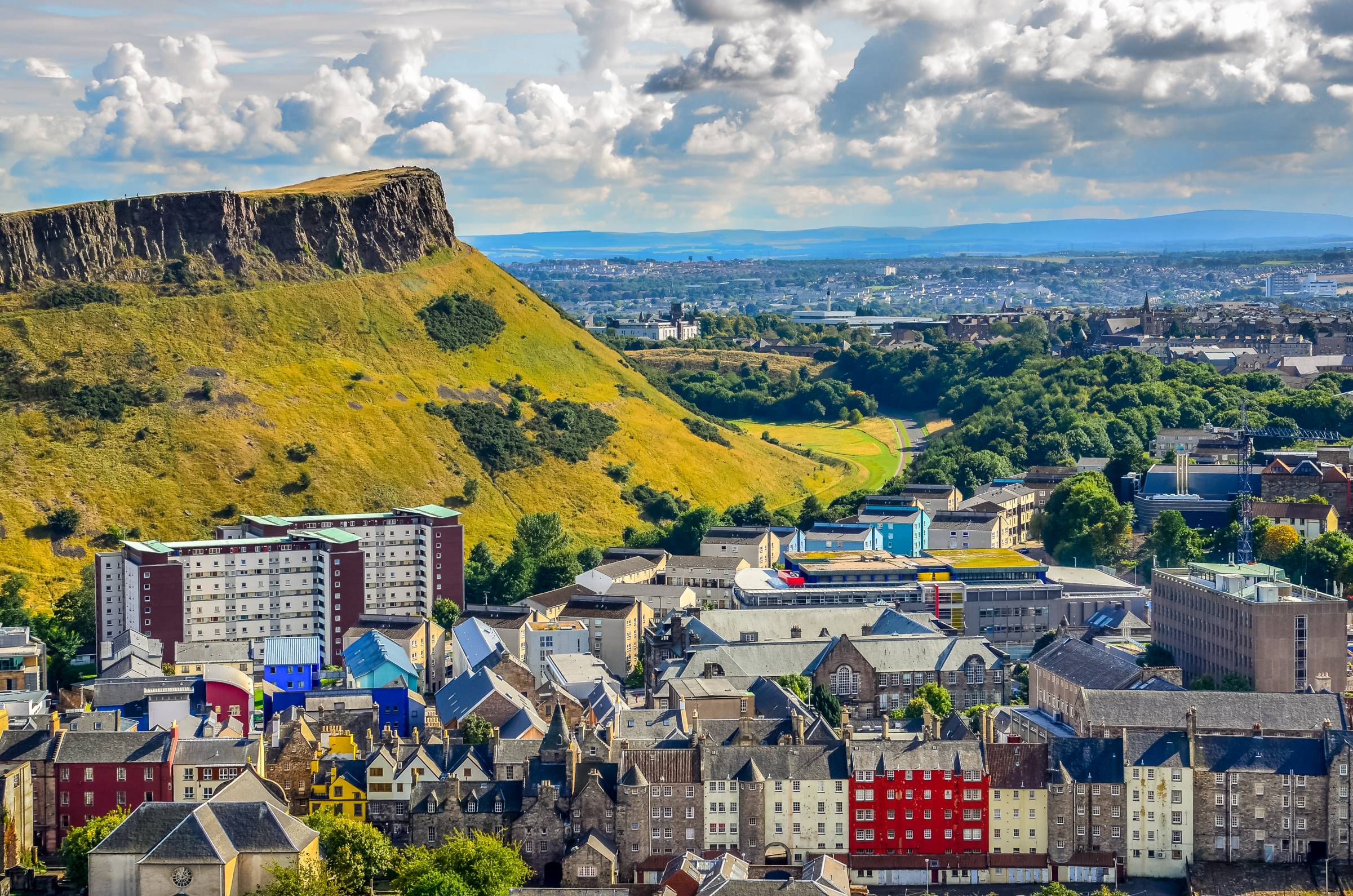 Aerial view of Arthur's Seat an extinct volcano and the surrounding city.