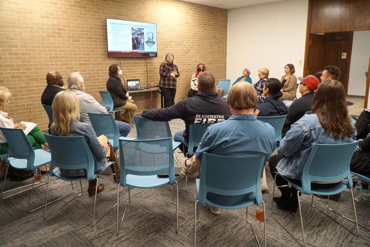 Dr. Elizabeth K. Eger and Rex Long speaking at the Gladewater Library.