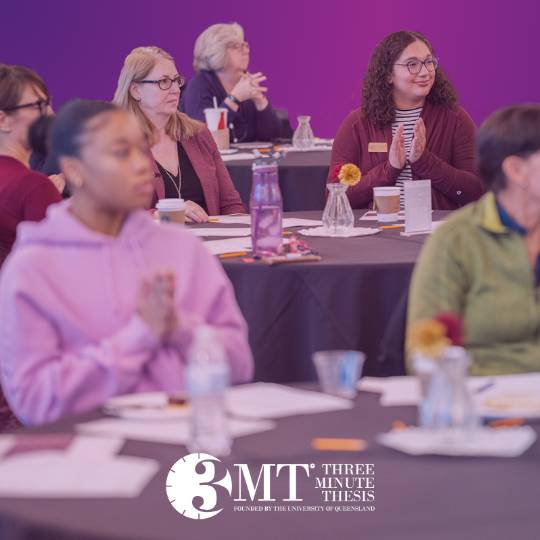 3MT logo with a background of an audience watching a presenter