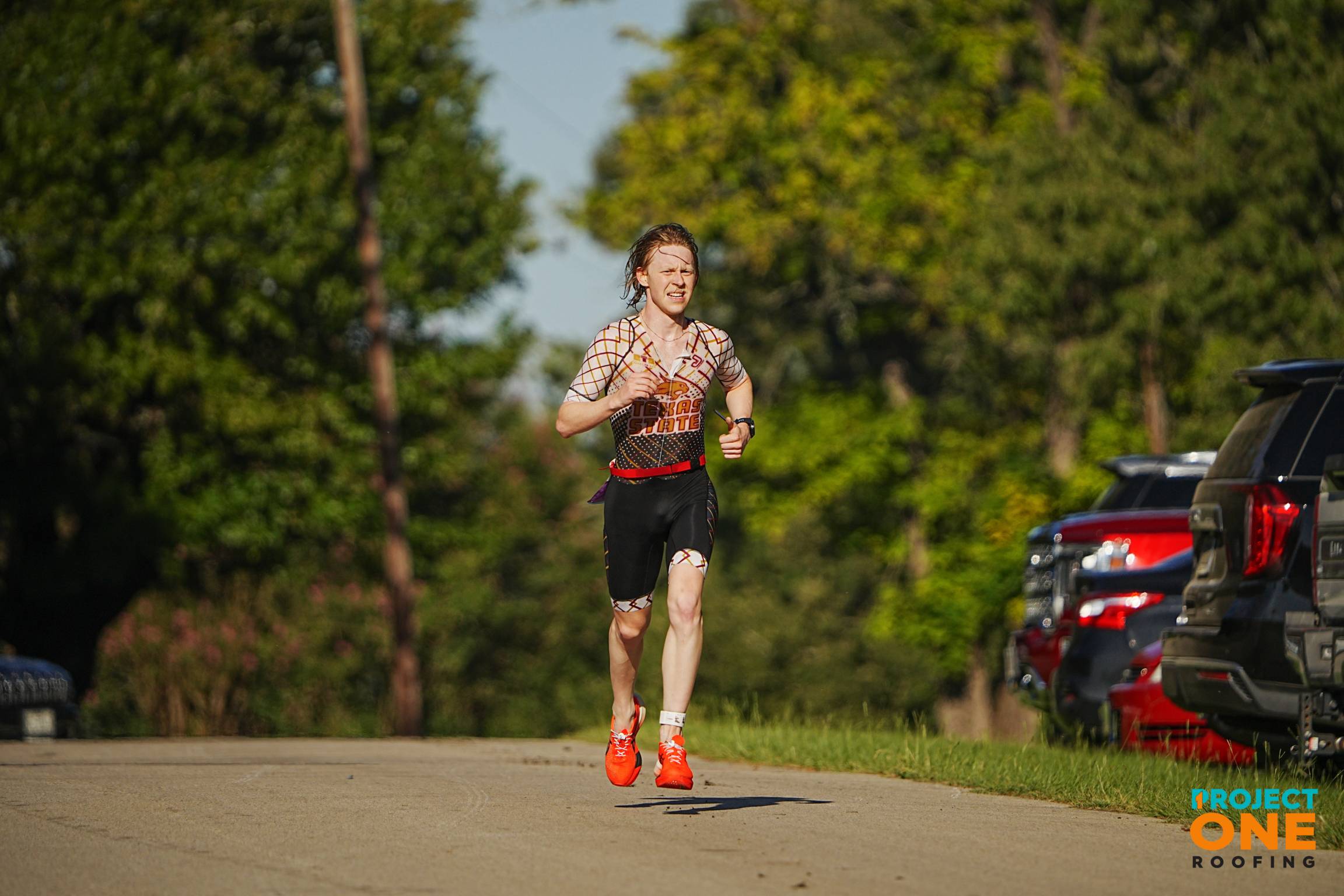 triathlon sport club member running in a triathlon race