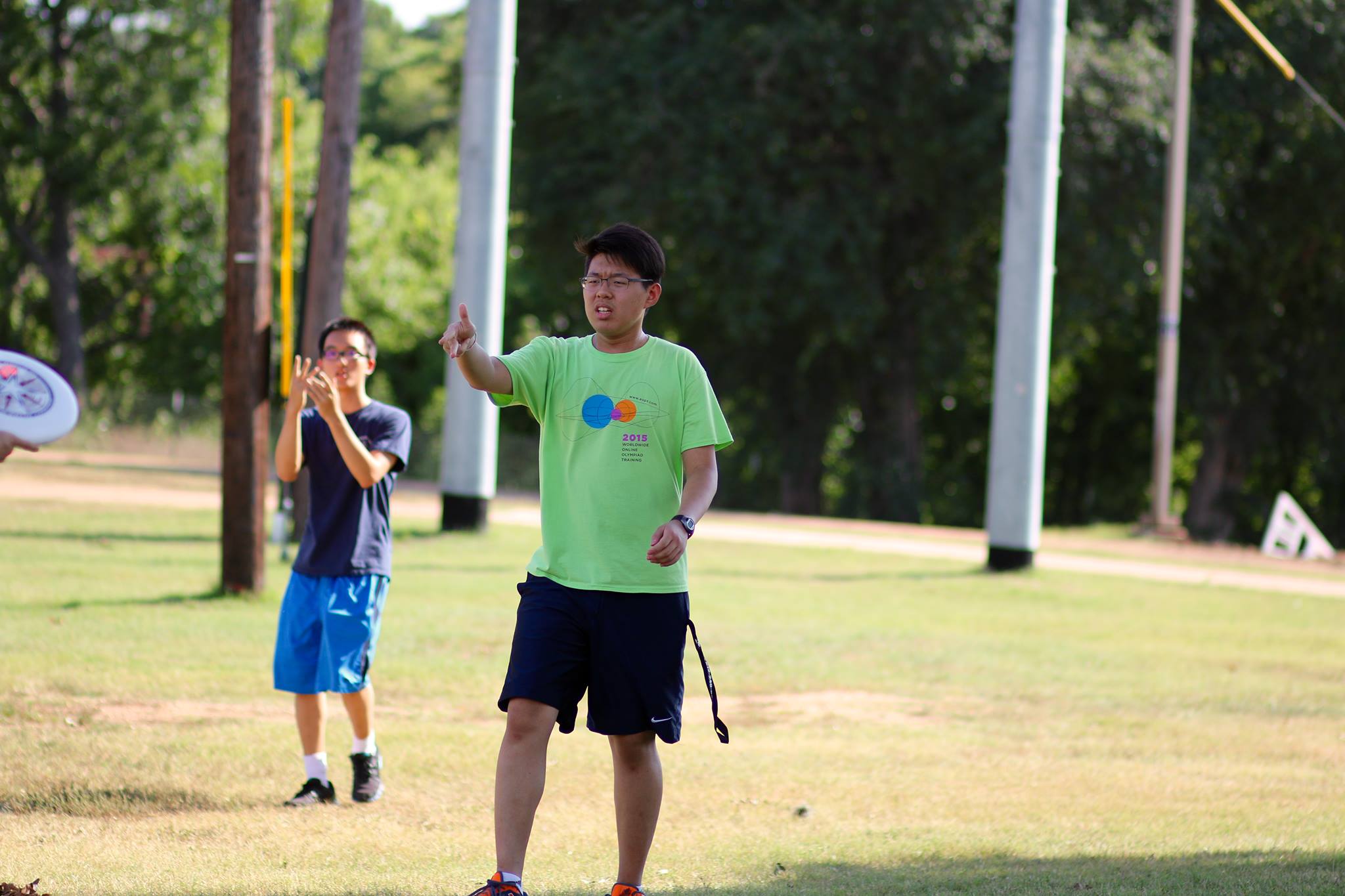 HSMC students play frisbee during free time
