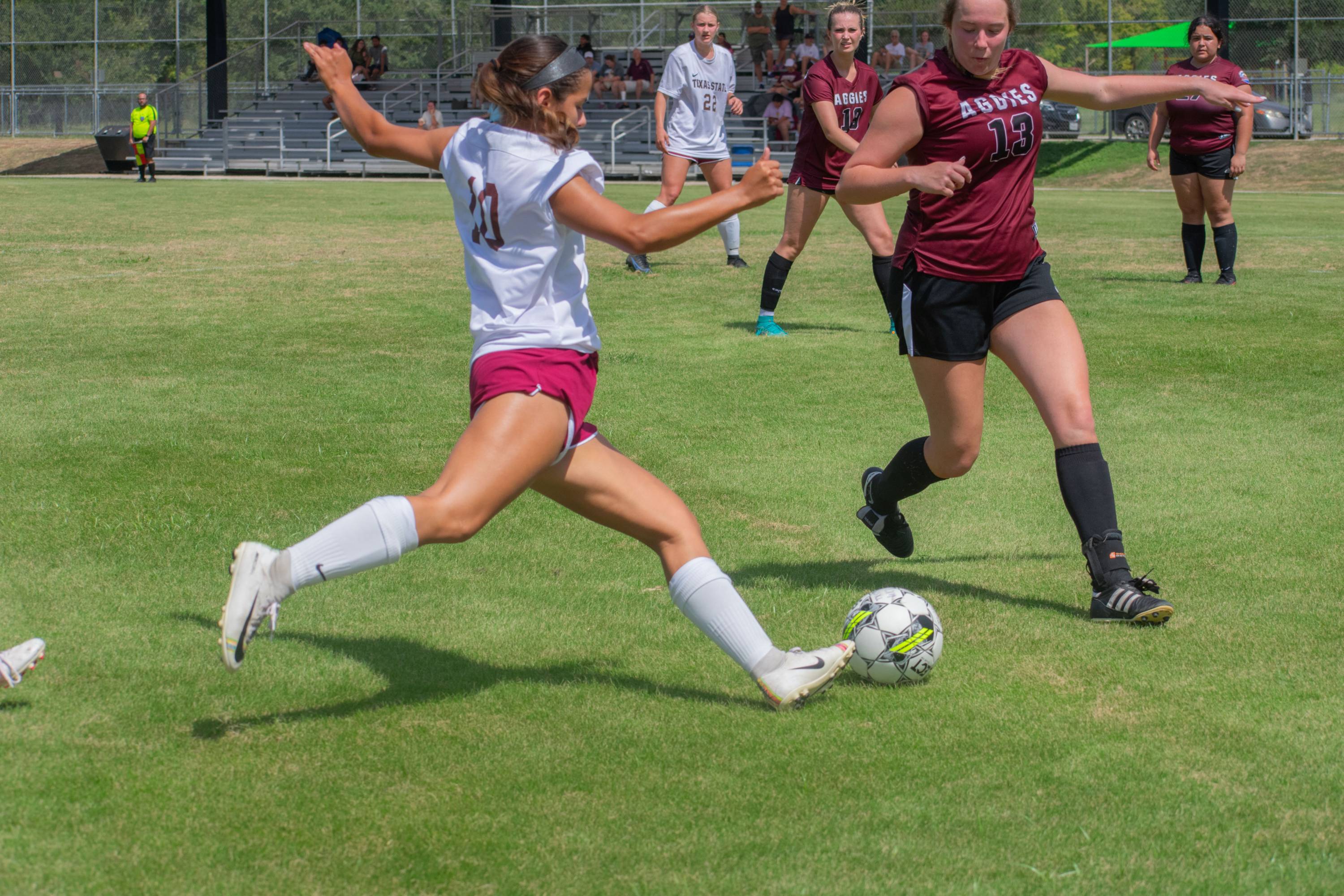 Women's Soccer versus Texas A&M Galveston kicking ball