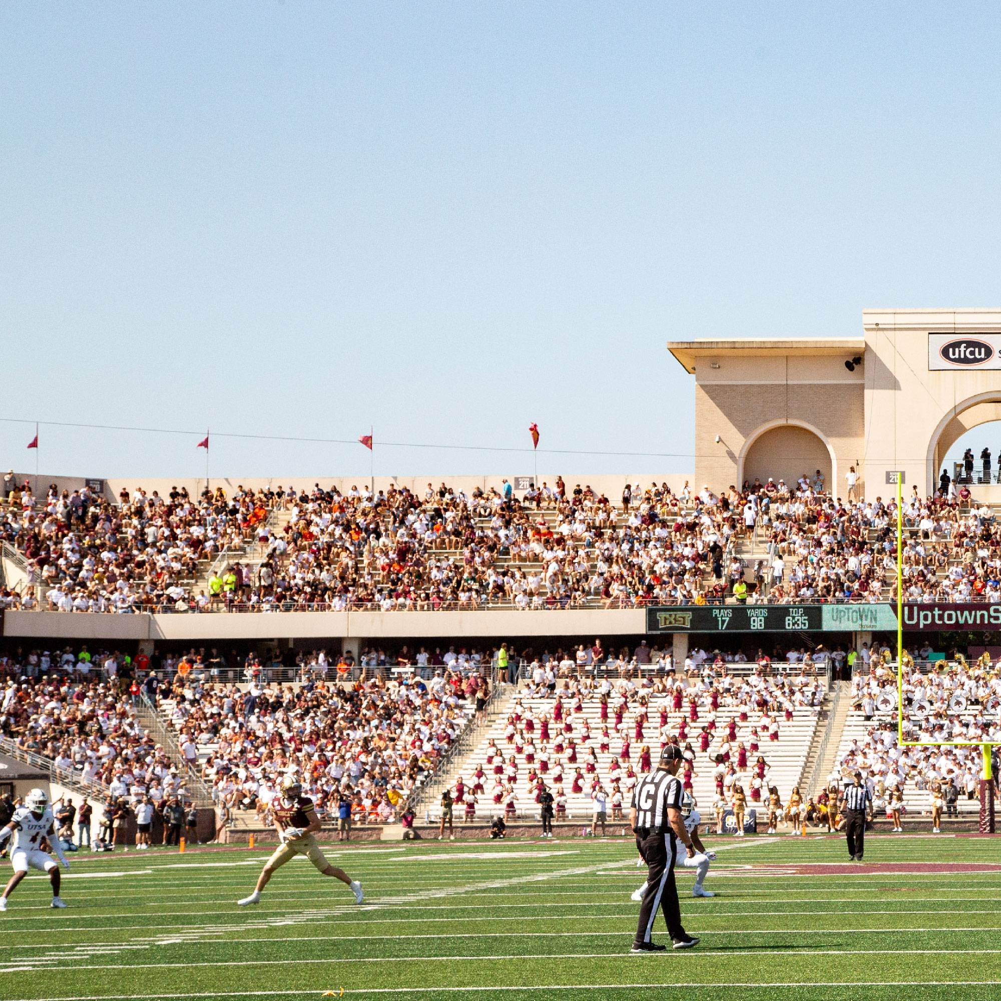 UFCU Stadium during a football game on a sunny day