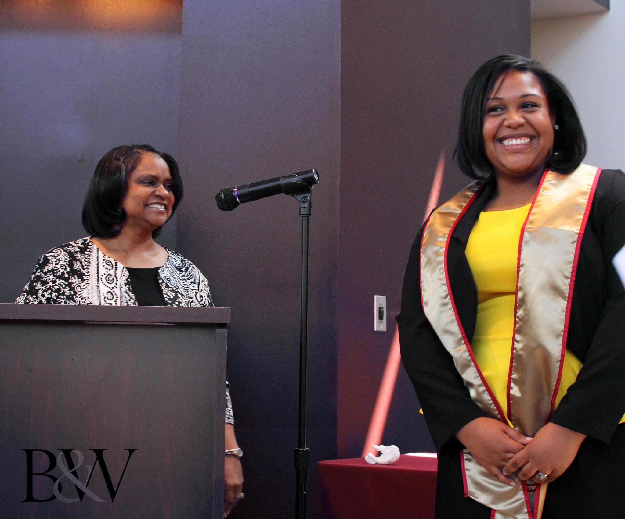 Dr. Laurie Fluker smiling at a Circle of Achievement recipient