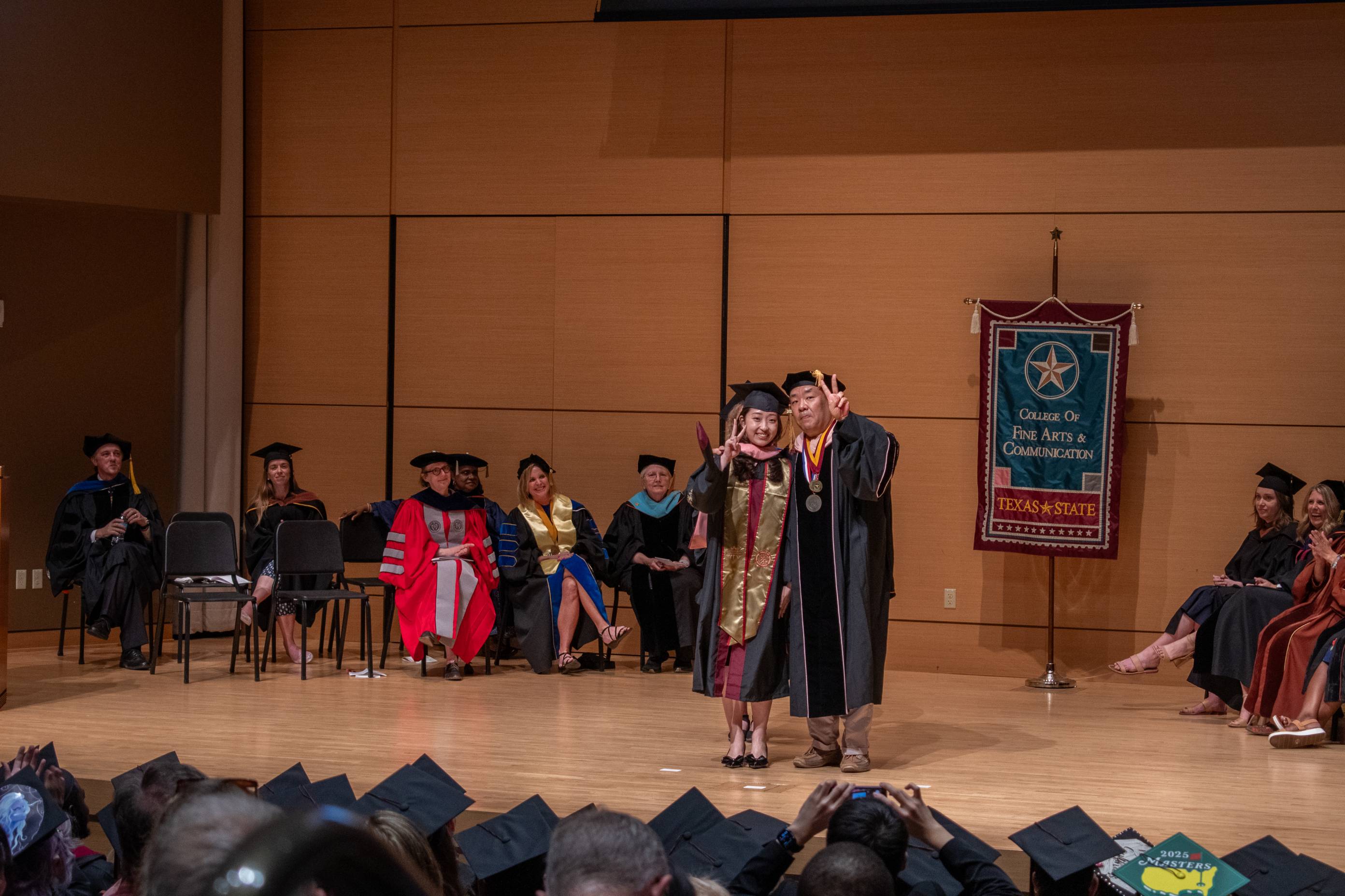 Students at the Masters Hooding Ceremony