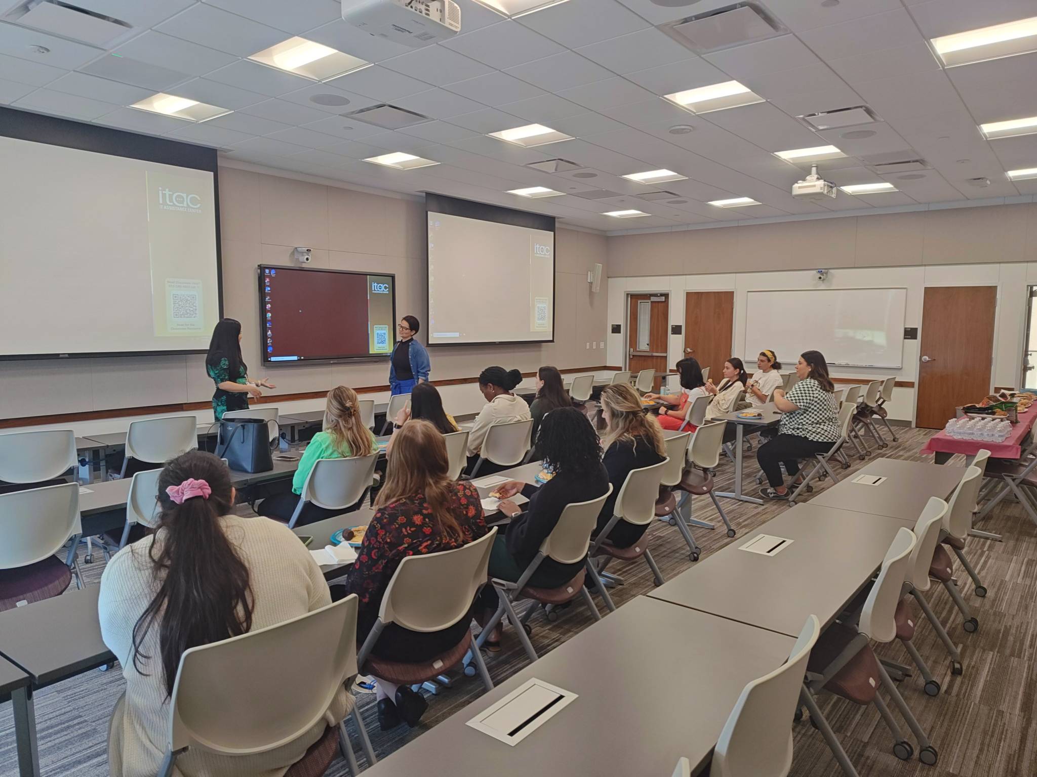 Dr. Resendiz and Barbara Fernandez interchanging ideas with the students.